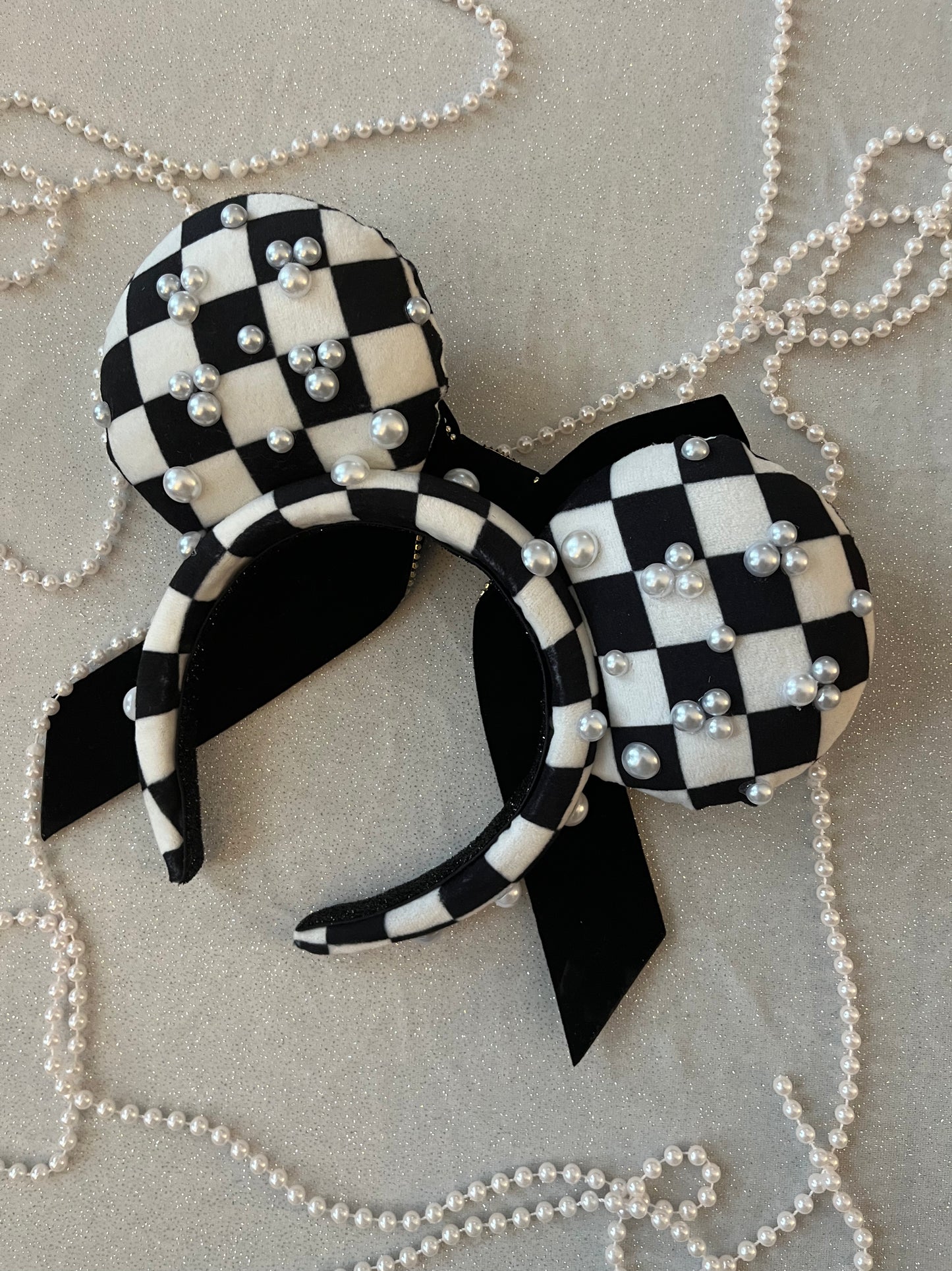 Checkerboard put a bow on it ears